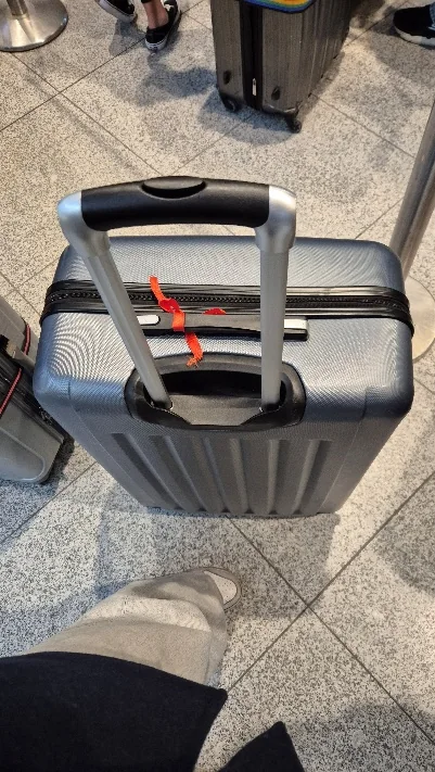 Suitcase at the airport during the Sal-Tech supplier trip.
