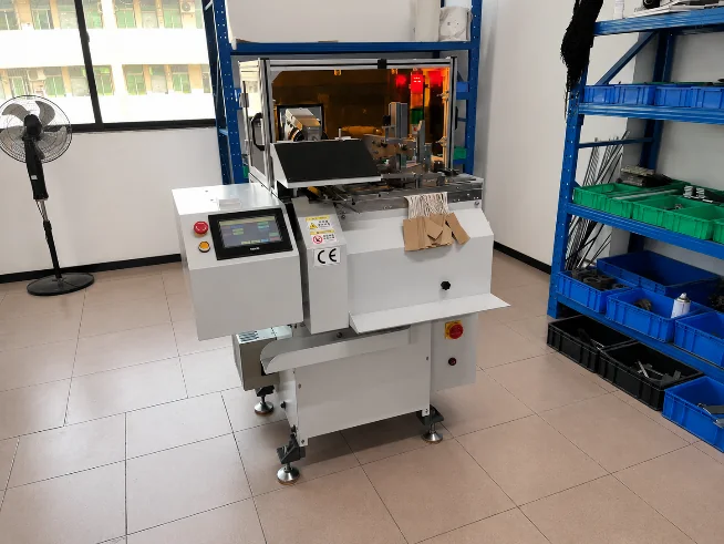 STEP LM-LY3 Full Automatic Tag Threader Machine prepared for customer delivery.